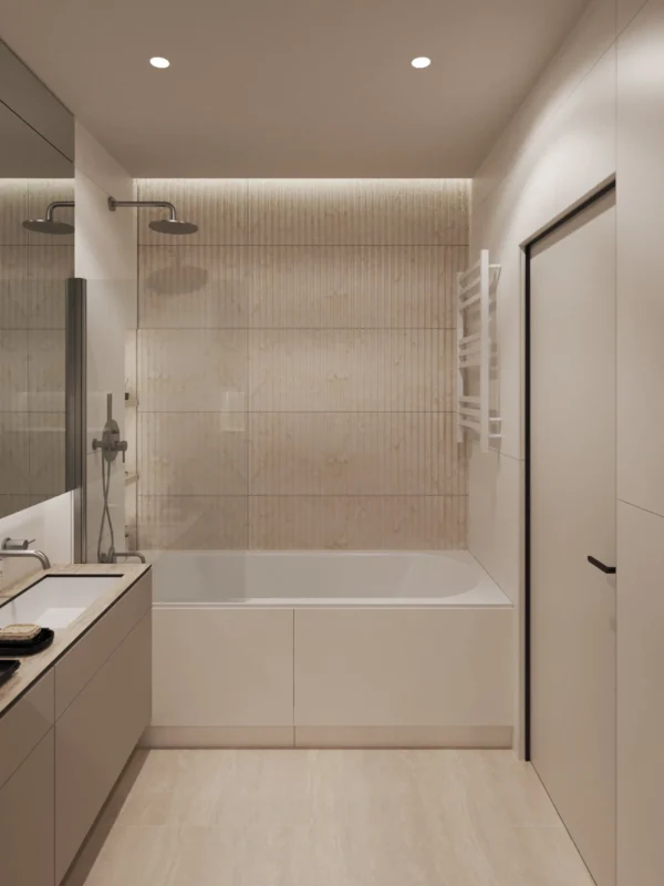 Bathtub with a rain shower, a fluted tile wall and a vanity unit