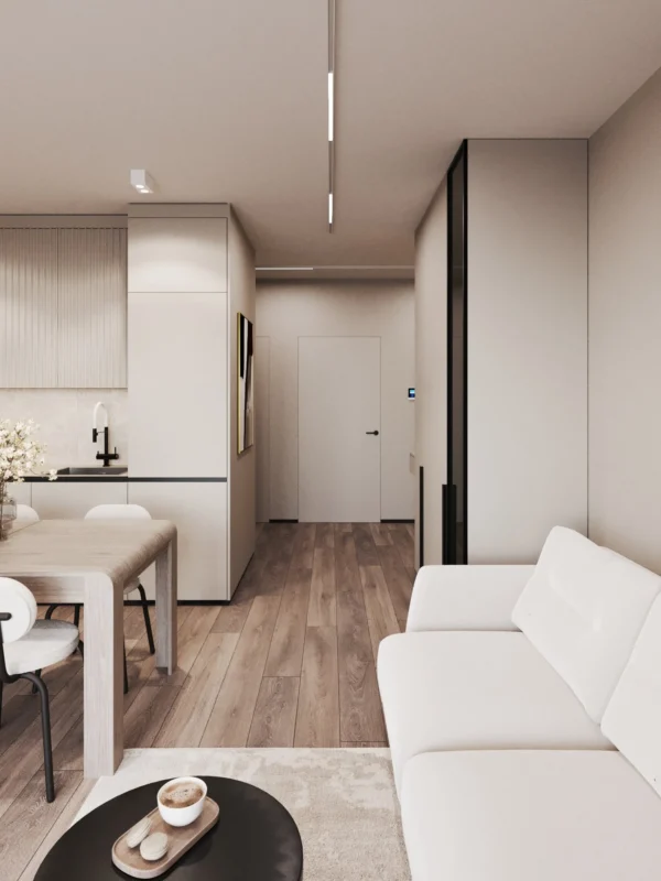 View from the living room to the kitchen and hallway with flush-mounted doors
