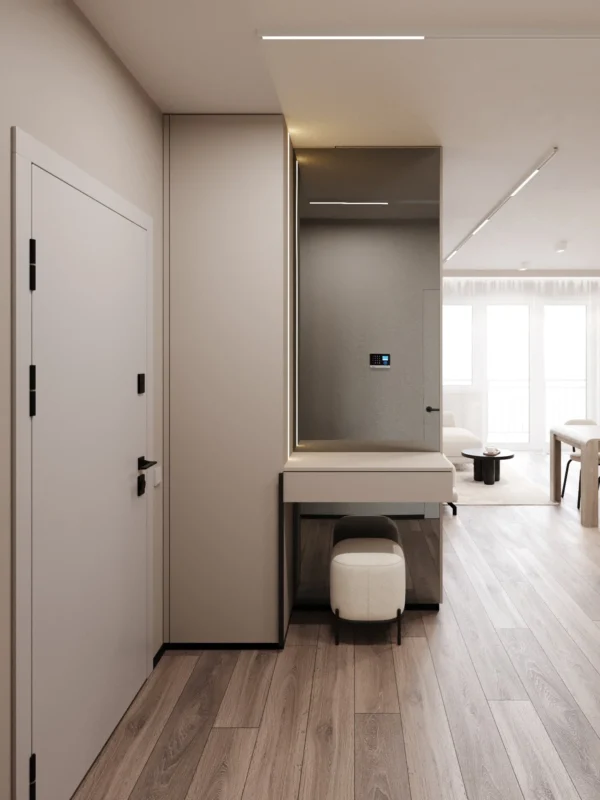 Entry area: console with a pouf, graphite mirror and a view to the living room