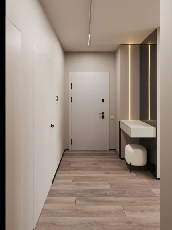 Hallway with the front door, a console and an LED-lit niche