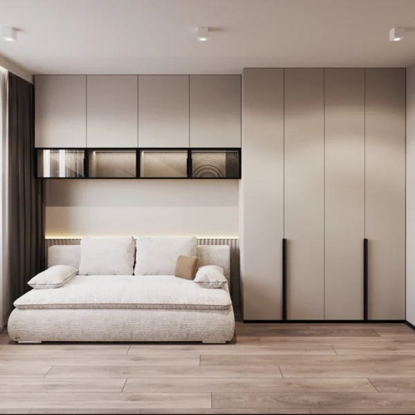 Sofa bed under tinted-glass shelves with lighting and a floor-to-ceiling wardrobe