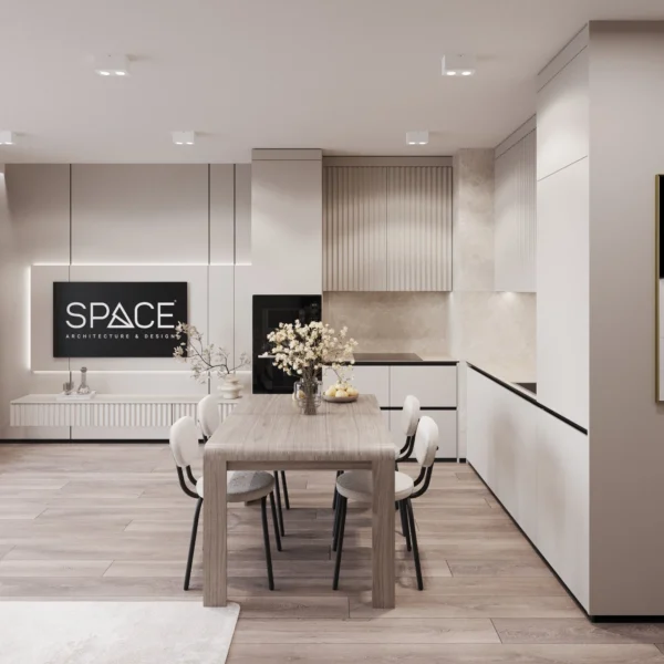 L-shaped kitchen with light fronts, a dining area and a backlit TV wall