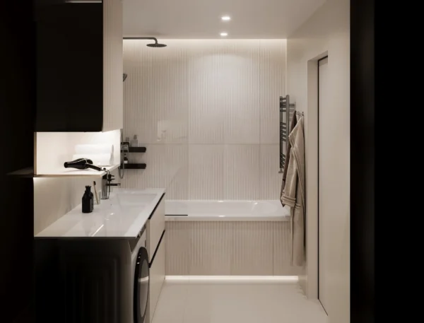 Bath with fluted wall tiles, lighting above the bath and a vanity with washbasin