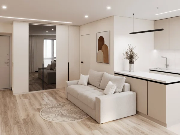 Sofa next to the kitchen island, a mirrored wardrobe and a linear pendant light