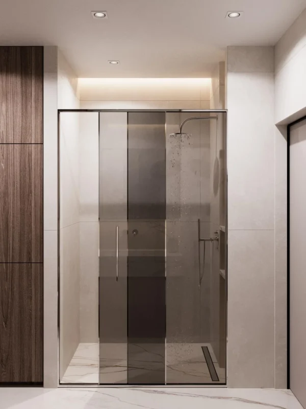 Shower with sliding tinted glass doors, a rain shower and a linear drain