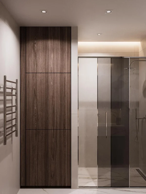 Tall built-in cabinet with wood fronts next to the shower