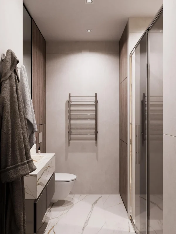 Towel rail, wall-hung WC and built-in cabinets in the bathroom