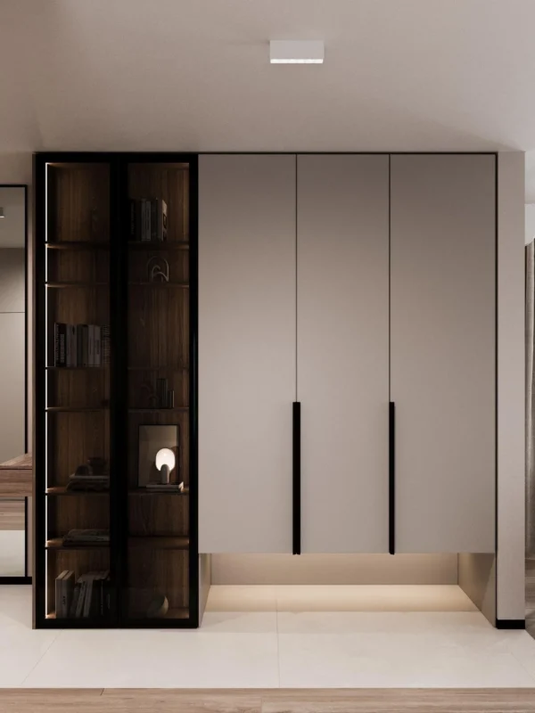 Coat wardrobe with under-lighting and a black-framed display cabinet