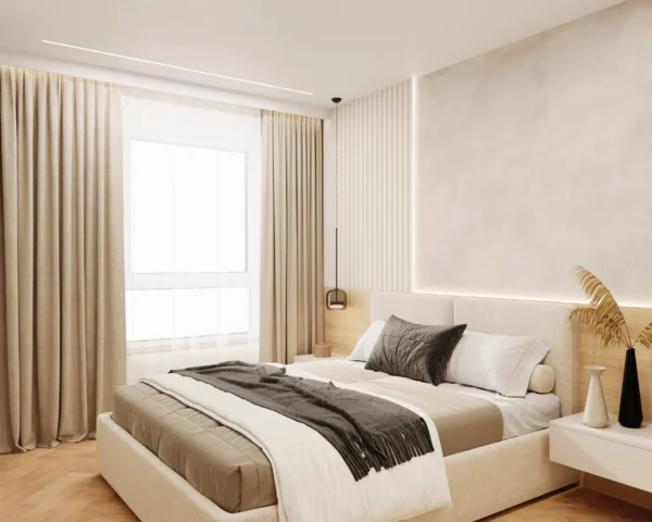 Bedroom: upholstered bed by the window, a textured plaster wall and a pendant light