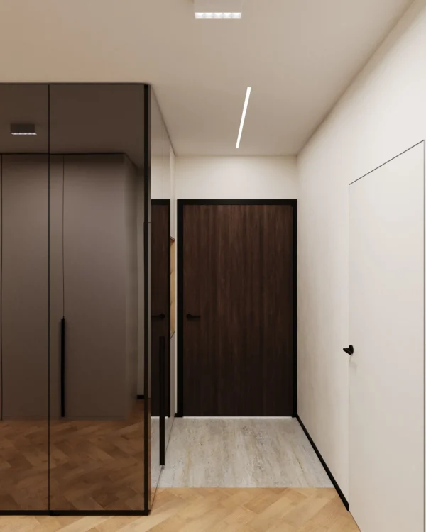 Entrance hall: graphite mirror wardrobe, a dark wood-look front door and flush doors