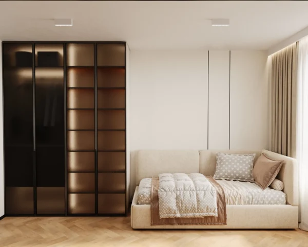 Tinted-glass wardrobe with lighting and an upholstered daybed in the kids' room