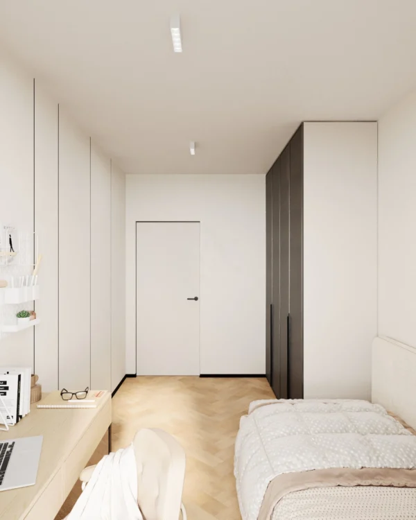 Kids' room: bed, a wall-length desk top and a flush-mounted door