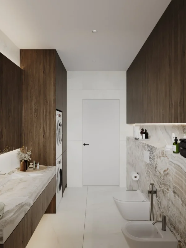 Bathroom with walnut cabinets, an onyx-look counter and a white door
