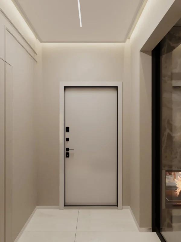 Front door in the vestibule with linear ceiling lights and light walls