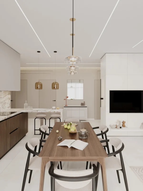 Long wooden dining table with chairs, the breakfast bar and the TV area