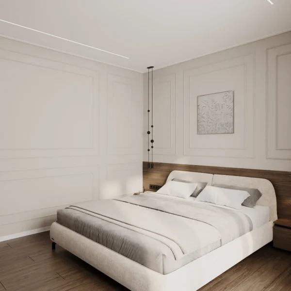 Bed in the master bedroom, pendant lights over the bedside table and art on a moulded wall