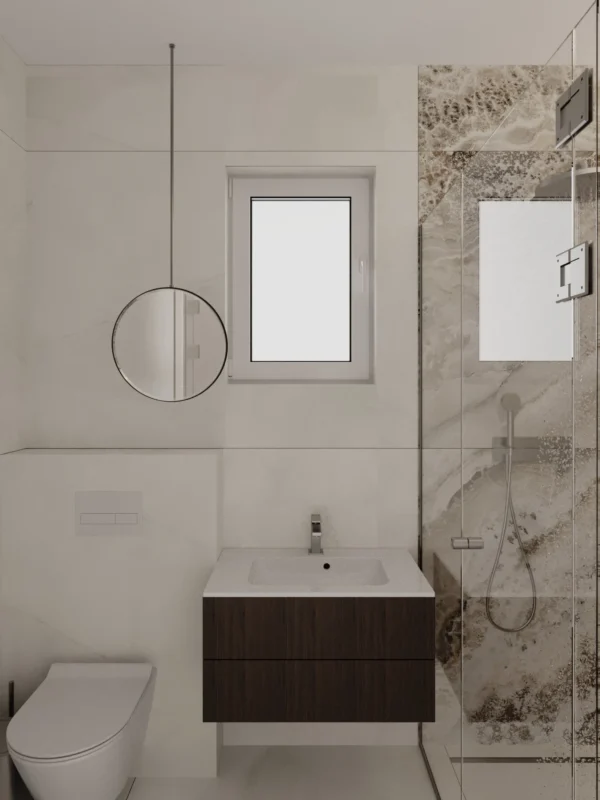 Guest shower room: wall-hung vanity, round mirror and a glass-enclosed shower