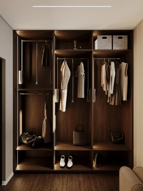 Walk-in wardrobe: open walnut sections with hanging rails and lighting