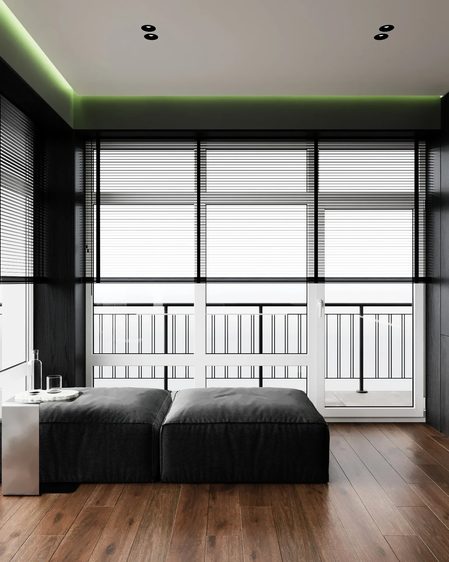 Lounge area by the large window in the home office