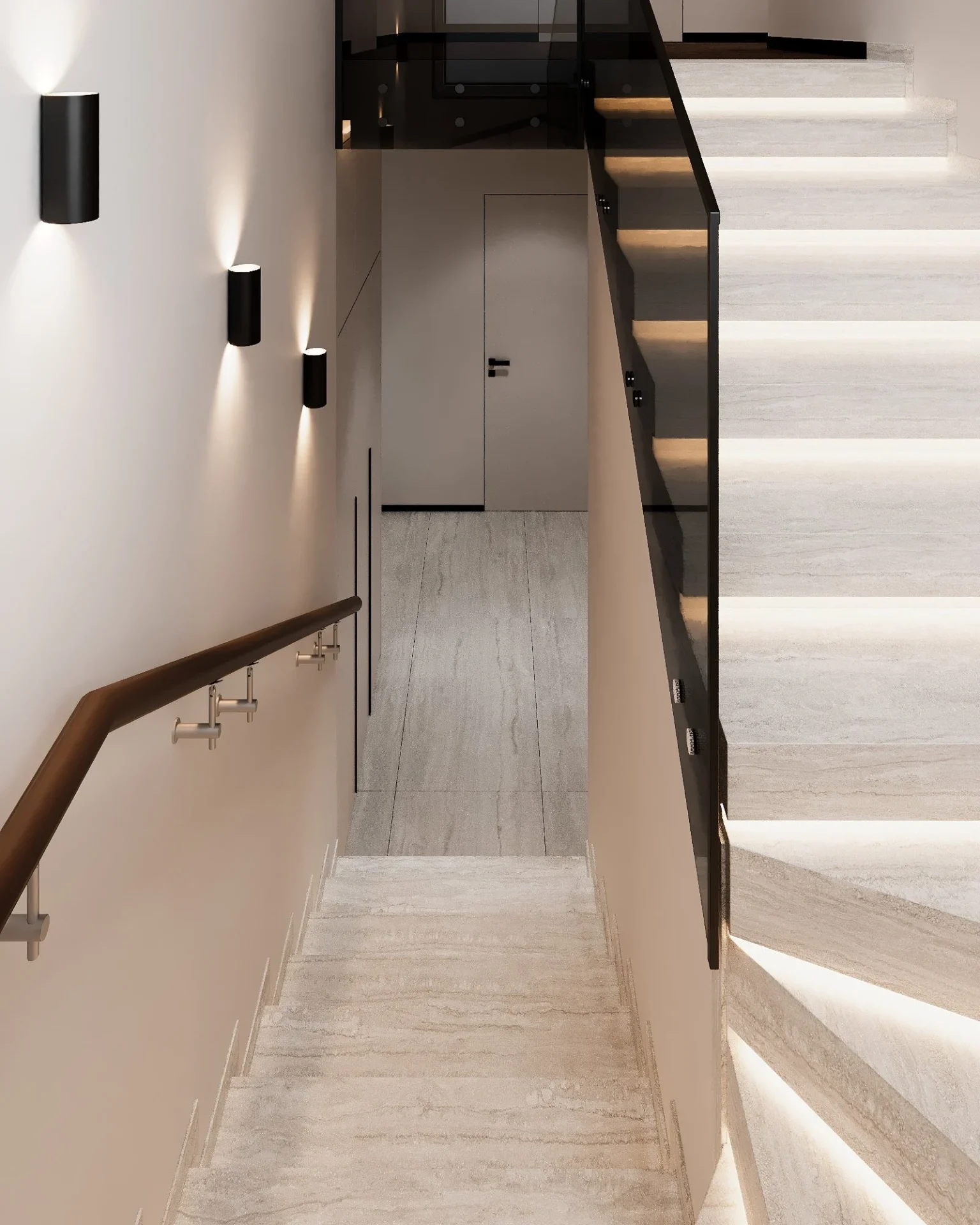 Stair flight with a glass balustrade, step lighting and wall lights